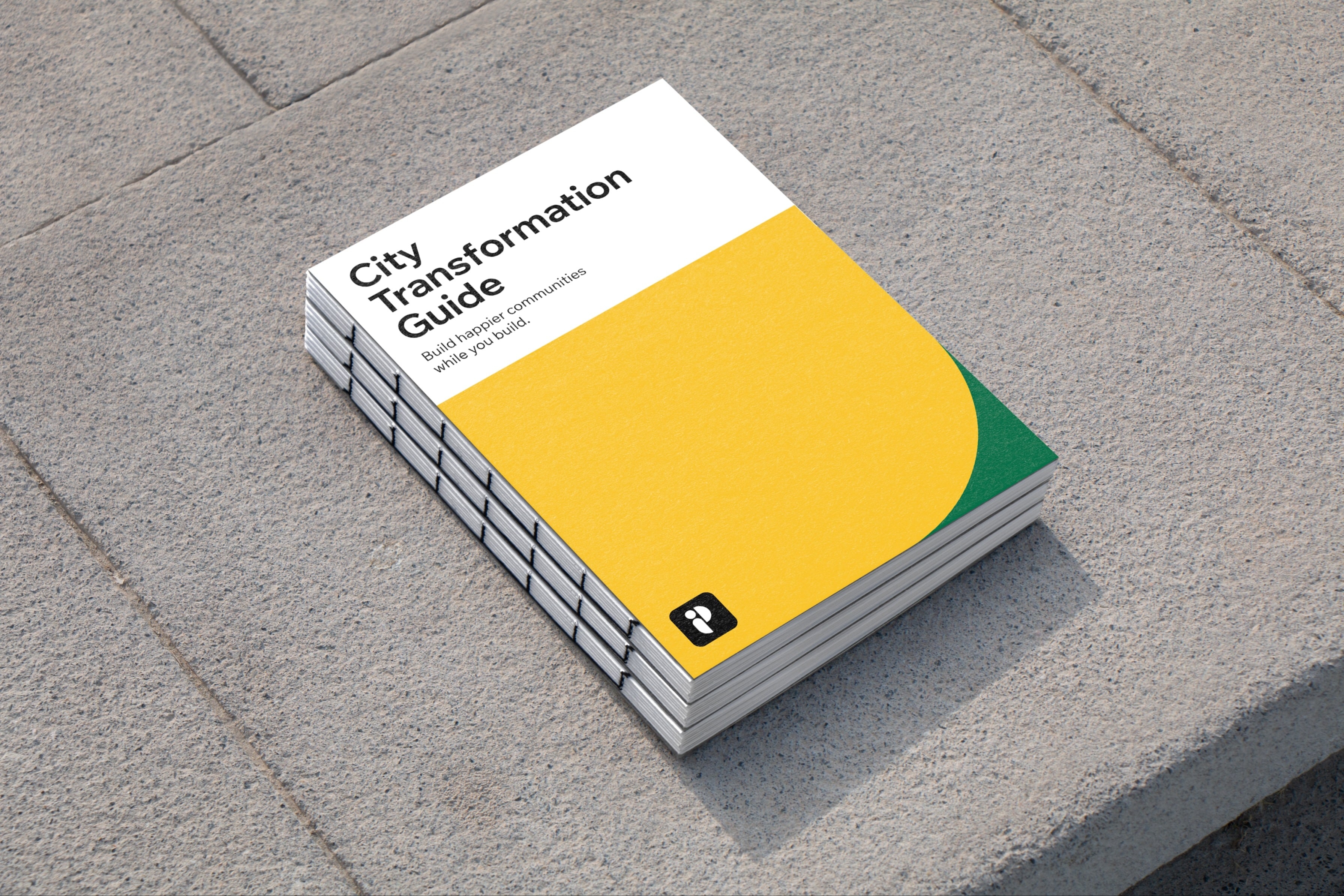 Stack of City Transformation Guide booklets